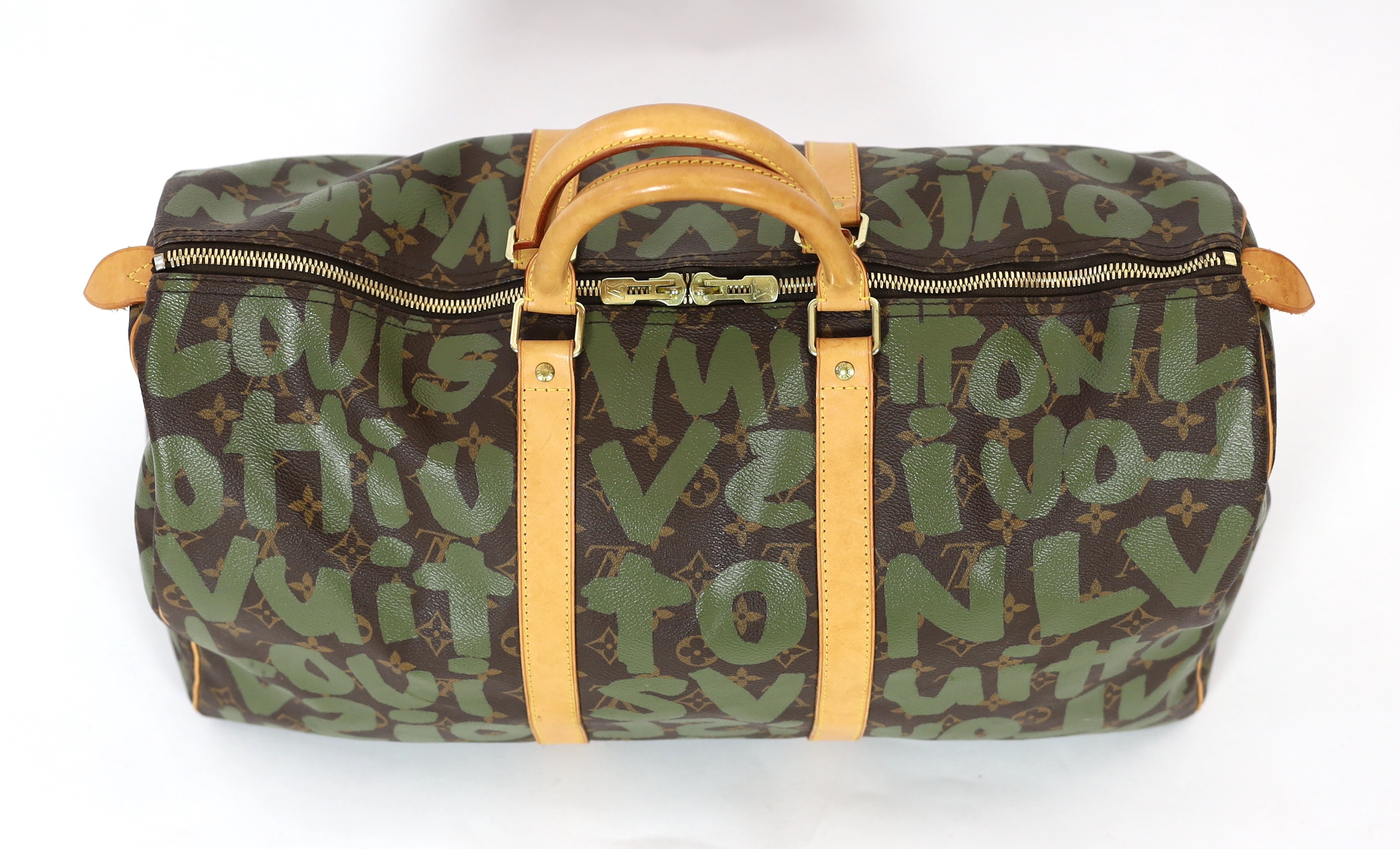 A vintage 2001 Louis Vuitton Stephen Sprouse Khaki Green Monogram Graffiti Keepall 50